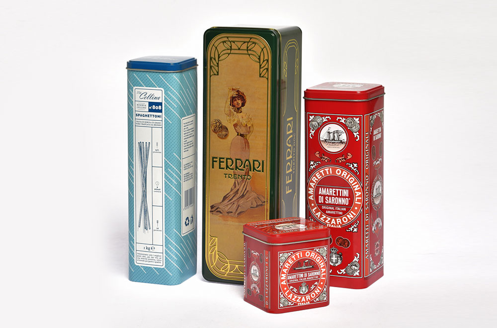Custom tin packaging examples including star, snowman and train shapes